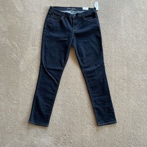 Never been worn mid-rise jeans from old navy. Paid with taxes $44.65